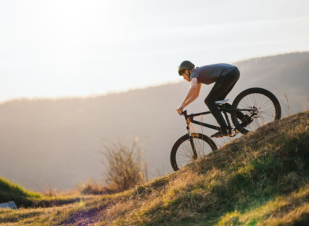 Cyclist riding downhill