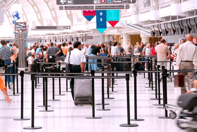 An international airport experiences long lines in the midst of a government shutdown