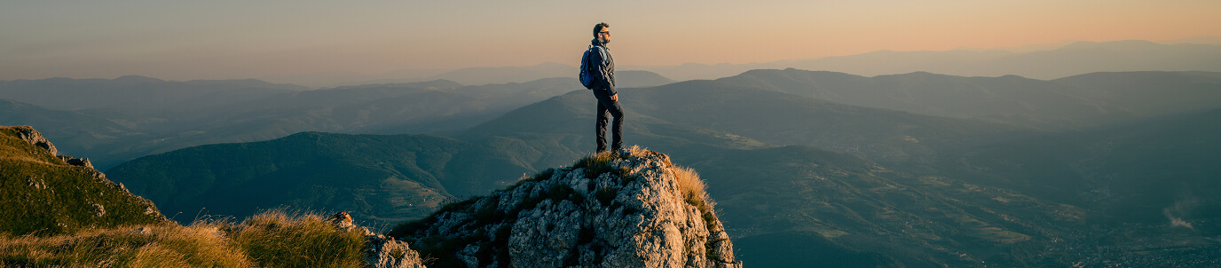 Man standing on a peak